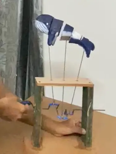 Detail view of whale sculpture mechanism
